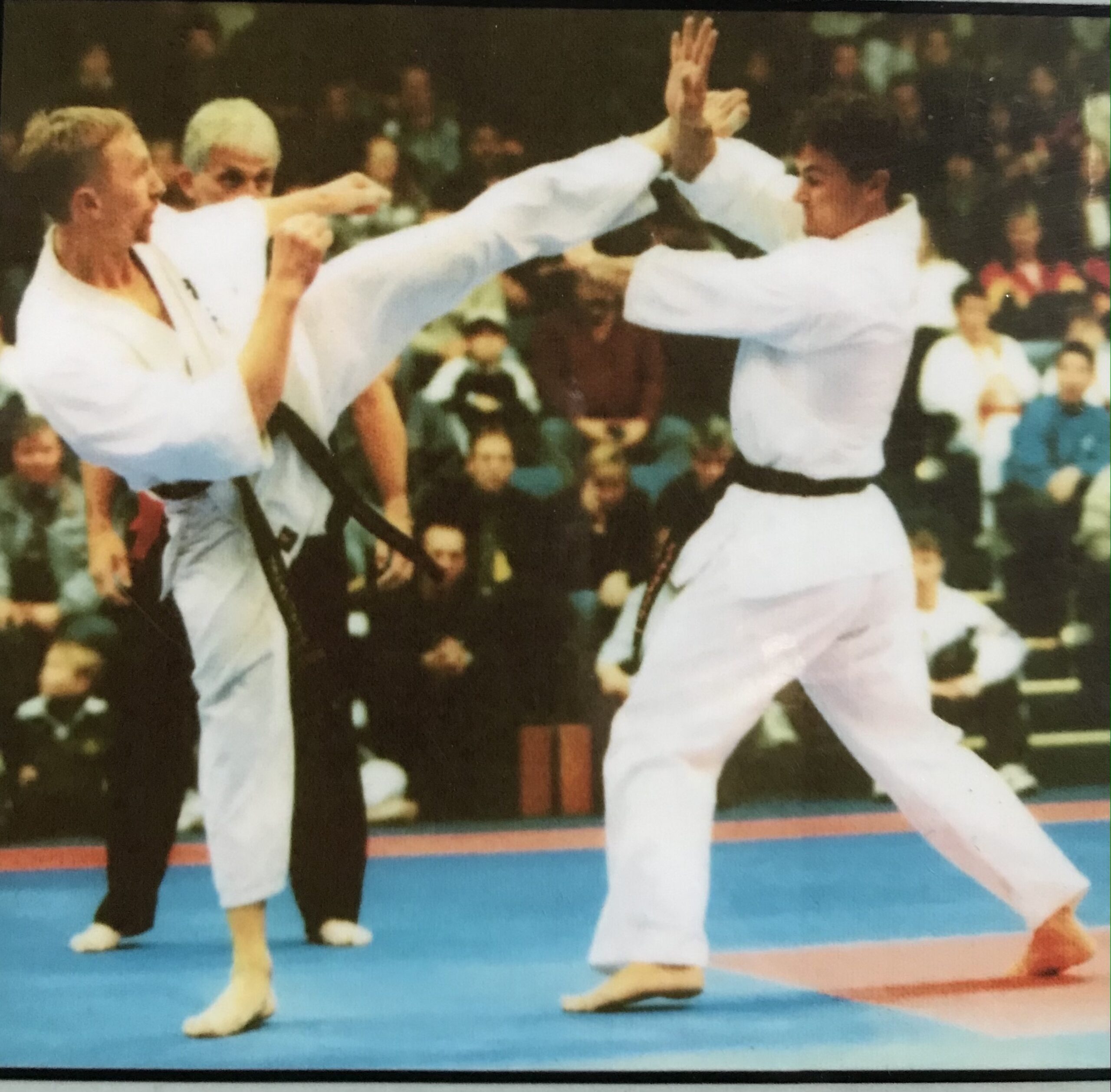 Executing head kick defence under pressure. Kyokushin International One Match Challenge, 1998. 